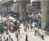 حي بولاق الدكرور يعيد الإنضباط لشارع ناهيا ويقوم بتشغيل السلم الكهربائي بالمزلقان|صور  